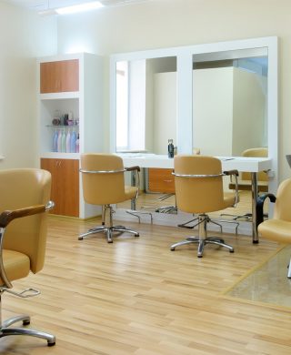 Interior of the barbershop in bright colors.Beauty salon. Place for hair cutting.